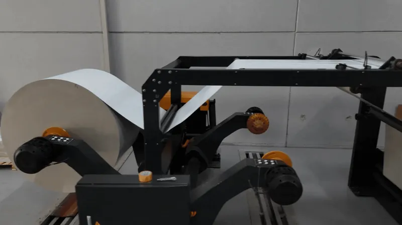 Paper reel feeding a converting machine